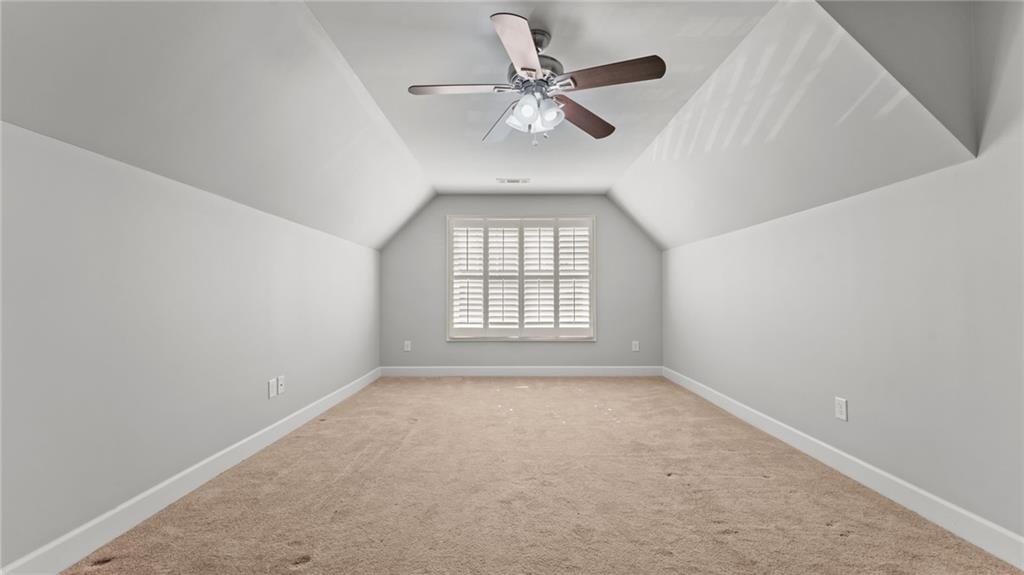 3418 Locust Cove Road Gainesville, GA 30504 - Photo 22 of 61 an empty room with windows and fan