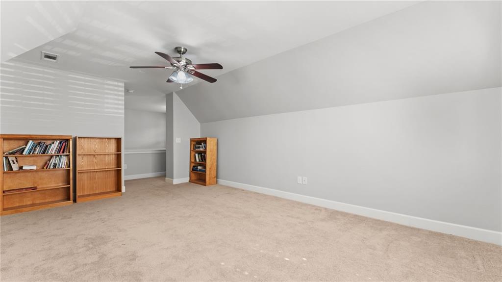 3418 Locust Cove Road Gainesville, GA 30504 - Photo 23 of 61 a view of an empty room with a window