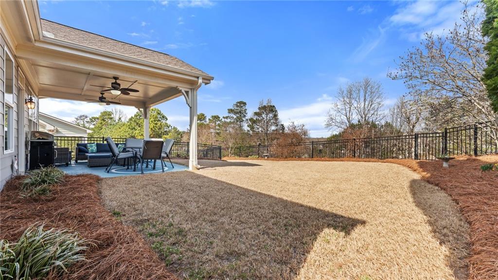 3418 Locust Cove Road Gainesville, GA 30504 - Photo 28 of 61 a view of backyard with sitting area