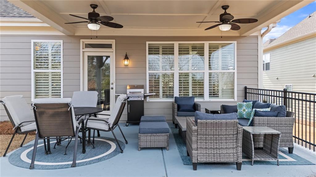 3418 Locust Cove Road Gainesville, GA 30504 - Photo 29 of 61 a living room with furniture and a large window