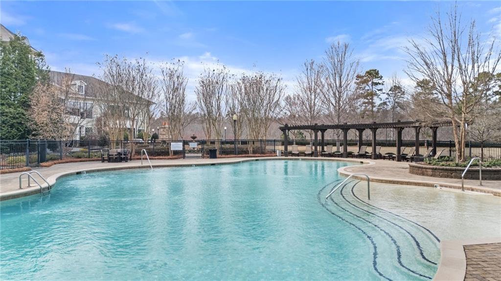 3418 Locust Cove Road Gainesville, GA 30504 - Photo 37 of 61 a view of a swimming pool with outdoor seating