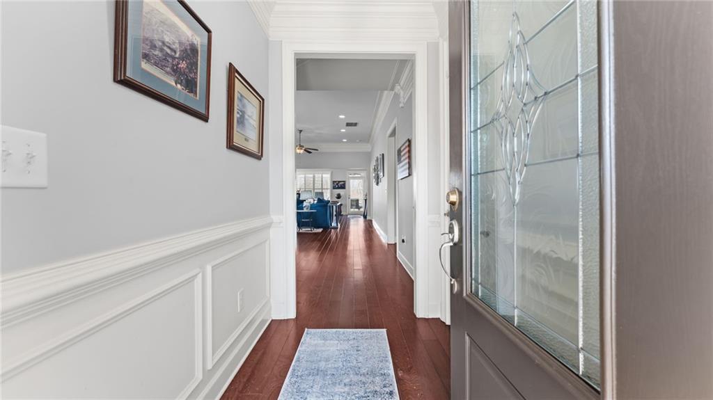 3418 Locust Cove Road Gainesville, GA 30504 - Photo 4 of 61 a view of a hallway with wooden floor and a bathroom
