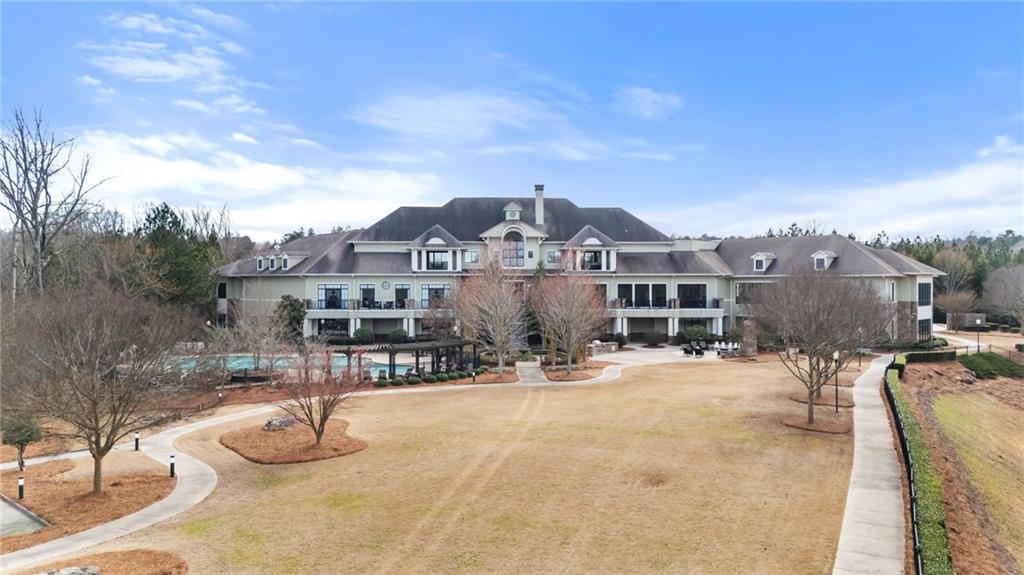 3418 Locust Cove Road Gainesville, GA 30504 - Photo 42 of 61 a view of a house with a swimming pool