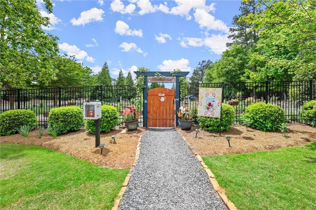 3418 Locust Cove Road Gainesville, GA 30504 - Photo 47 of 61 a garden view with a seating space