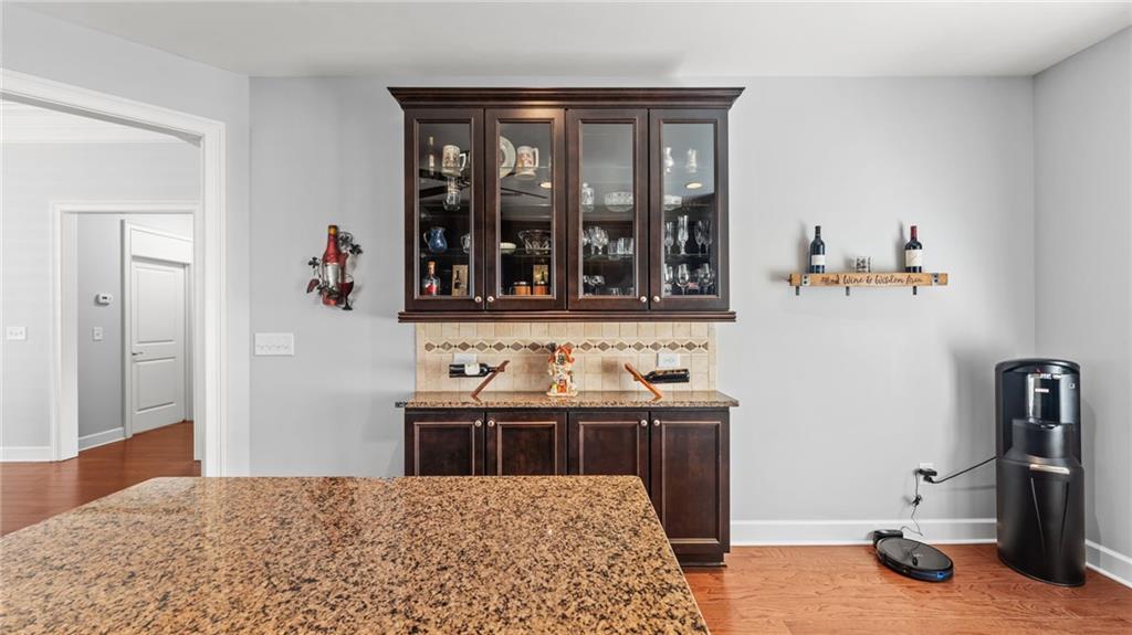 3418 Locust Cove Road Gainesville, GA 30504 - Photo 7 of 61 a bedroom with a bed and a dresser