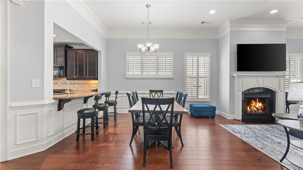3418 Locust Cove Road Gainesville, GA 30504 - Photo 9 of 61 a view of a dining room with furniture window and wooden floor