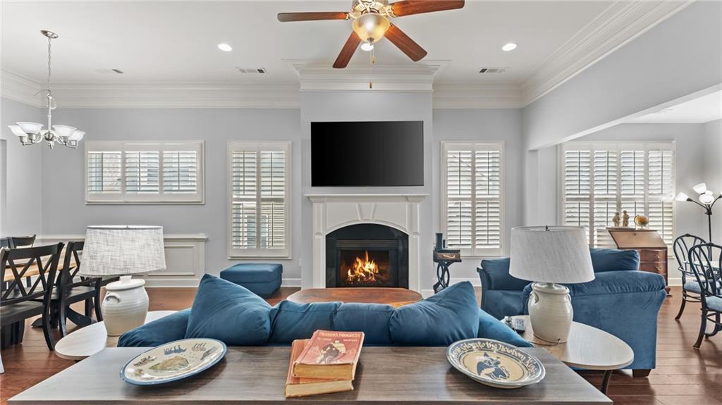 3418 Locust Cove Road Gainesville, GA 30504 - Photo 10 of 61 a living room with furniture and a fireplace