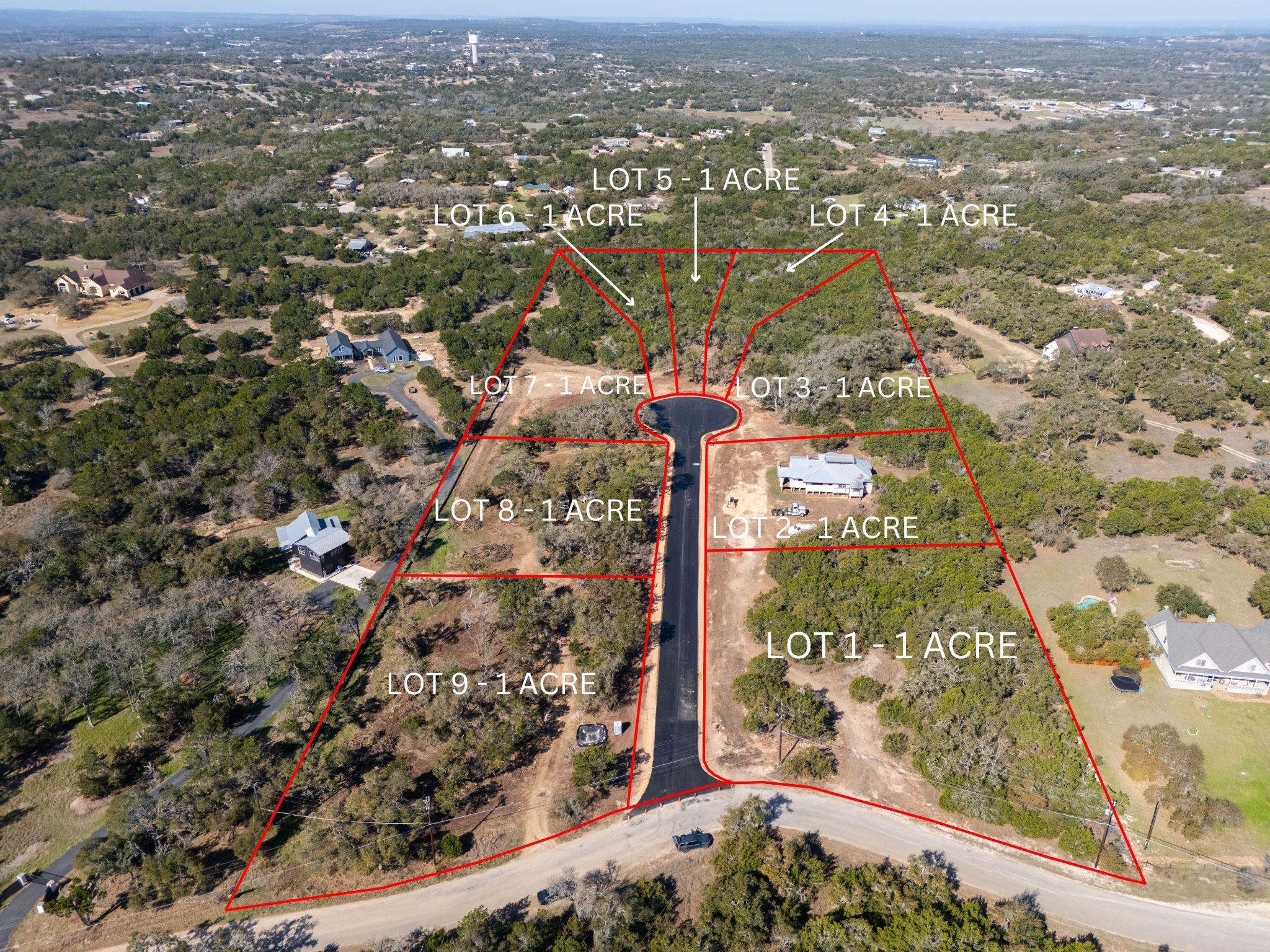 Lot-4 Lot-4 Spring Dripping Springs, TX 78620 - Photo 2 of 9 an aerial view of residential houses with outdoor space