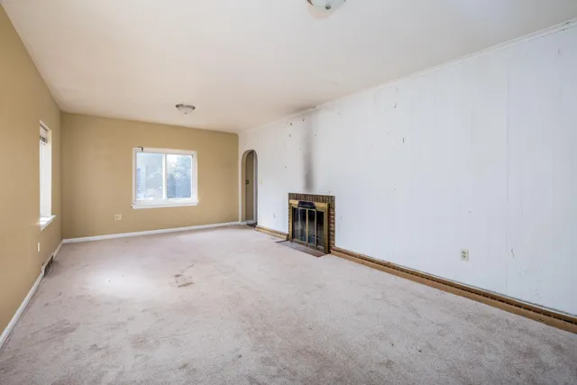 an empty room with windows