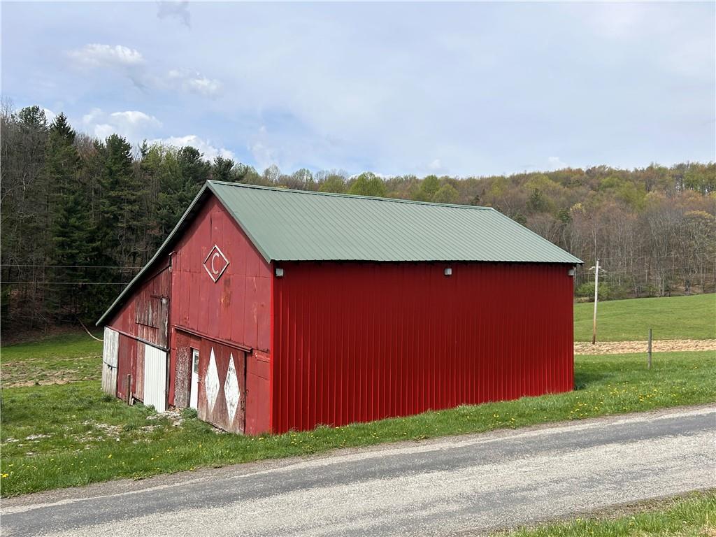 3940-3953 Groft Road Home, PA 15747 - Photo 11 of 20 a view of a yard with wooden fence