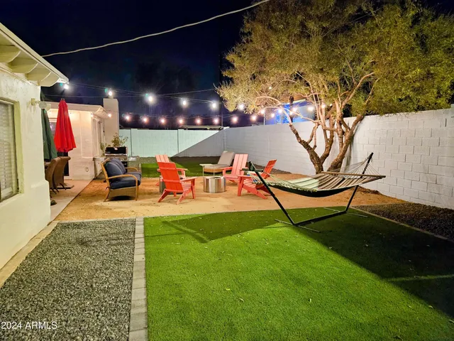 a view of an chairs and tables in the patio