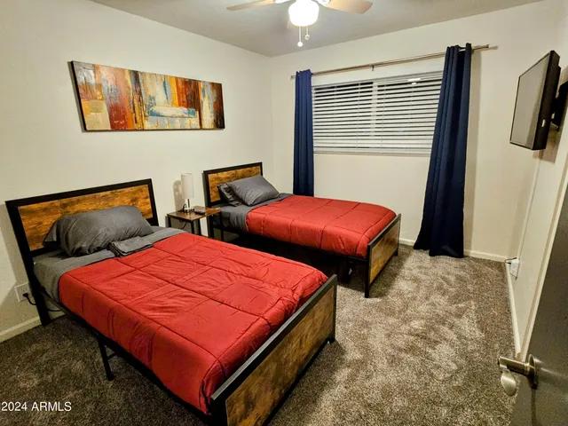 a view of a swimming pool with an outdoor seating