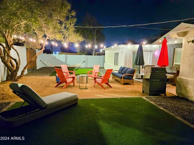 a outdoor space with lots of tables and chairs