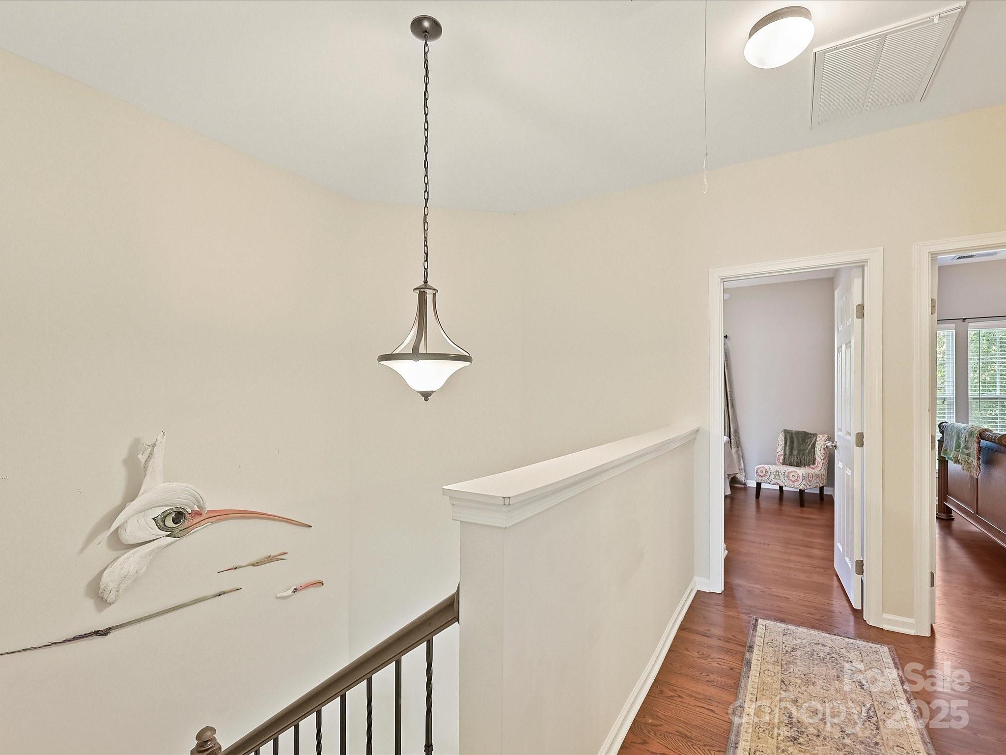 405 Armour Street Davidson, NC 28036 - Photo 19 of 33 a view of a hallway with closet