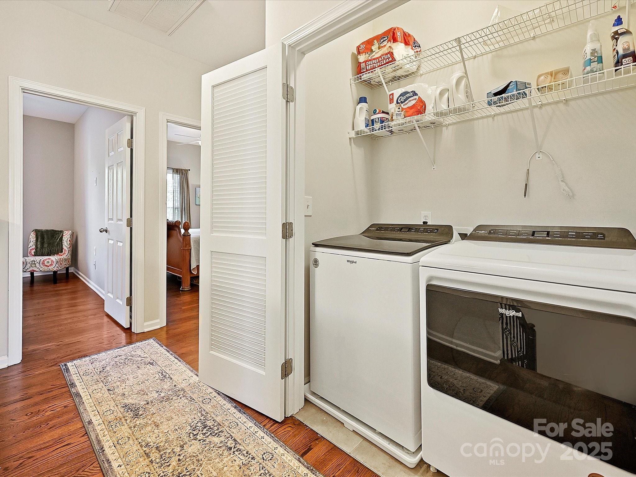 405 Armour Street Davidson, NC 28036 - Photo 27 of 33 a view of a storage & utility room with washer and dryer