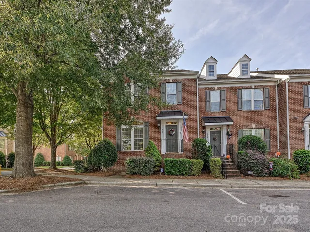 a front view of a house with yard
