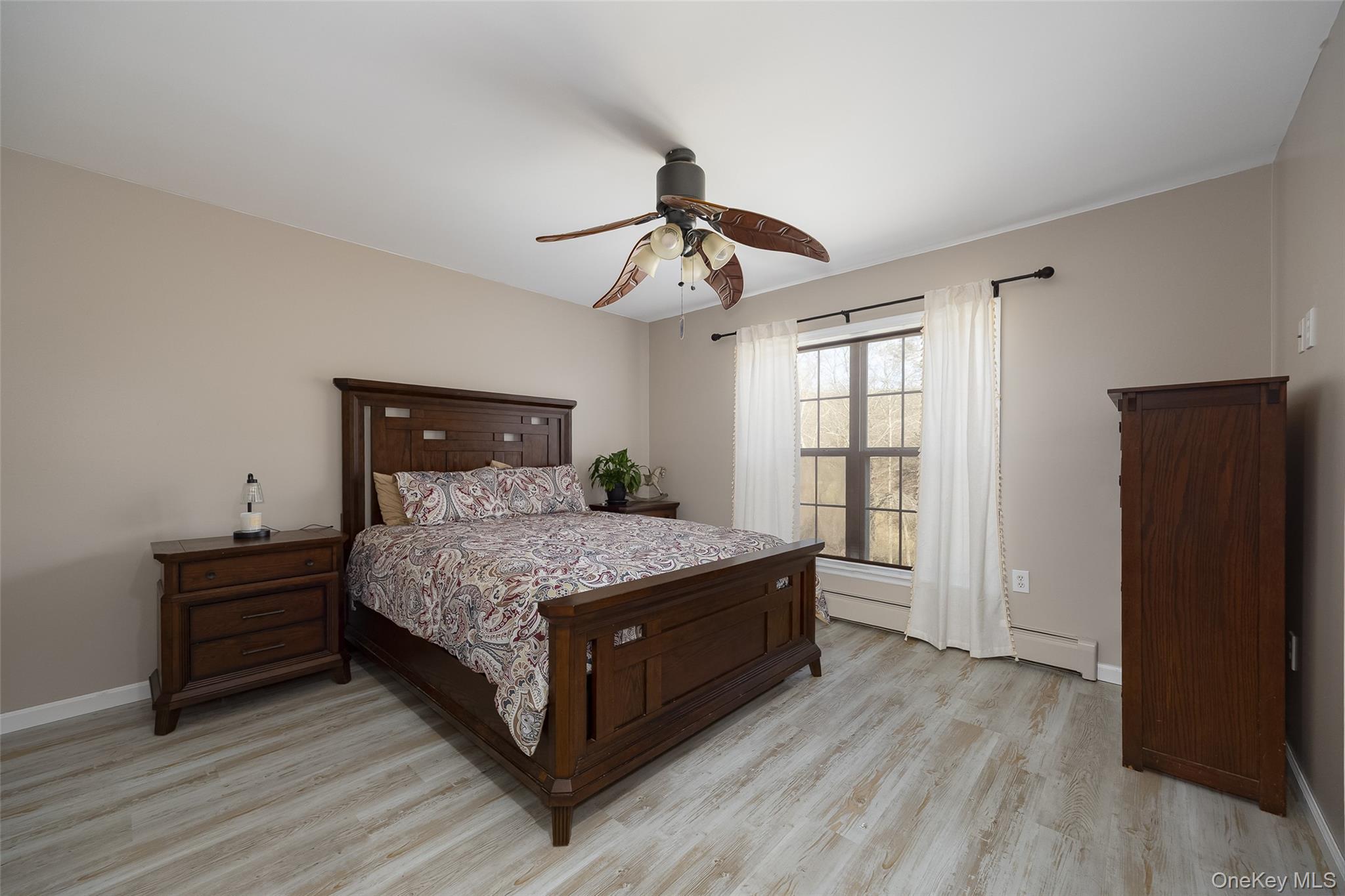 279 Milewood Road Millbrook, NY 12545 - Photo 16 of 33 a bed room with a bed and a window