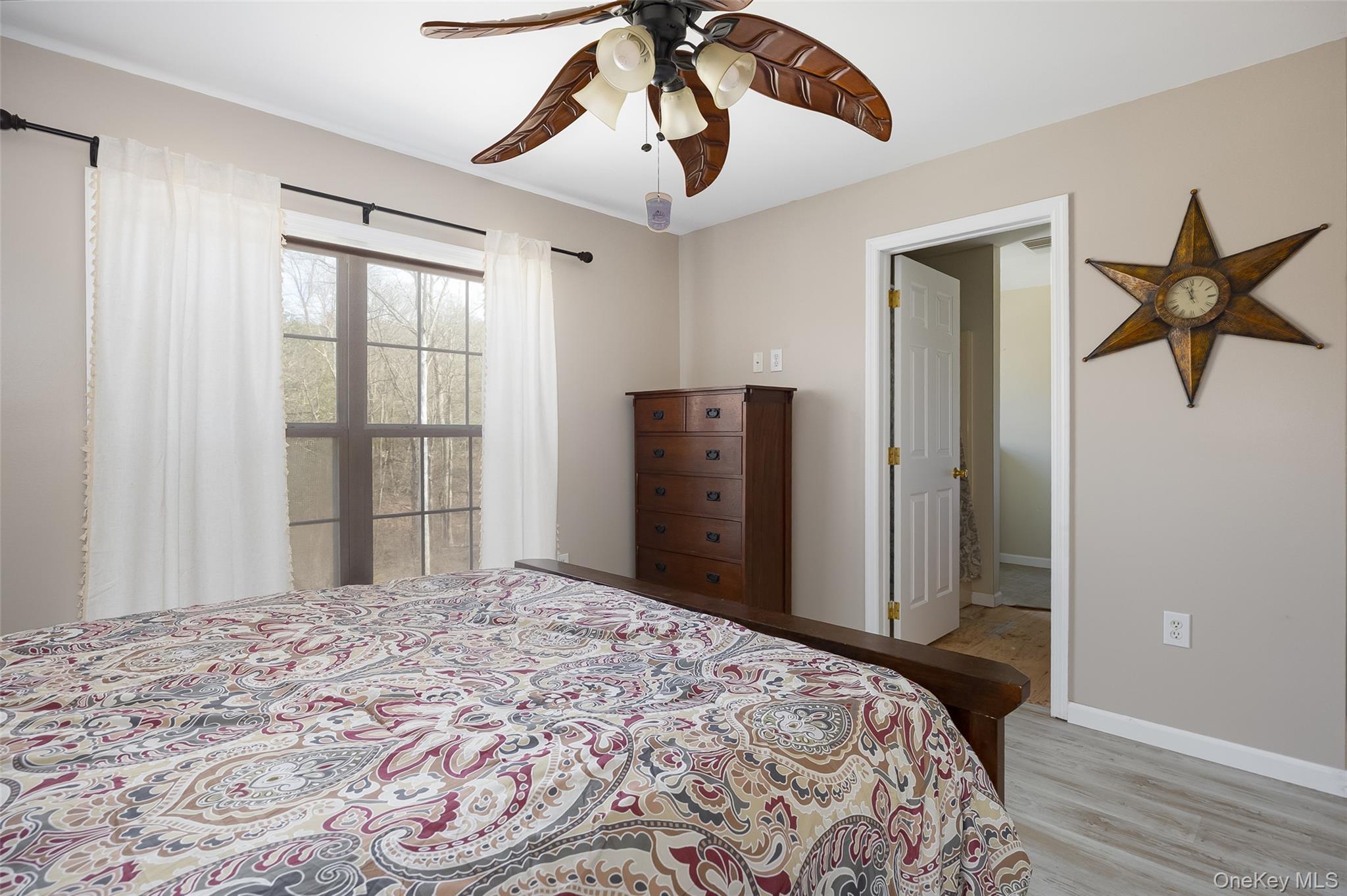 279 Milewood Road Millbrook, NY 12545 - Photo 17 of 33 a bedroom with a bed and a window