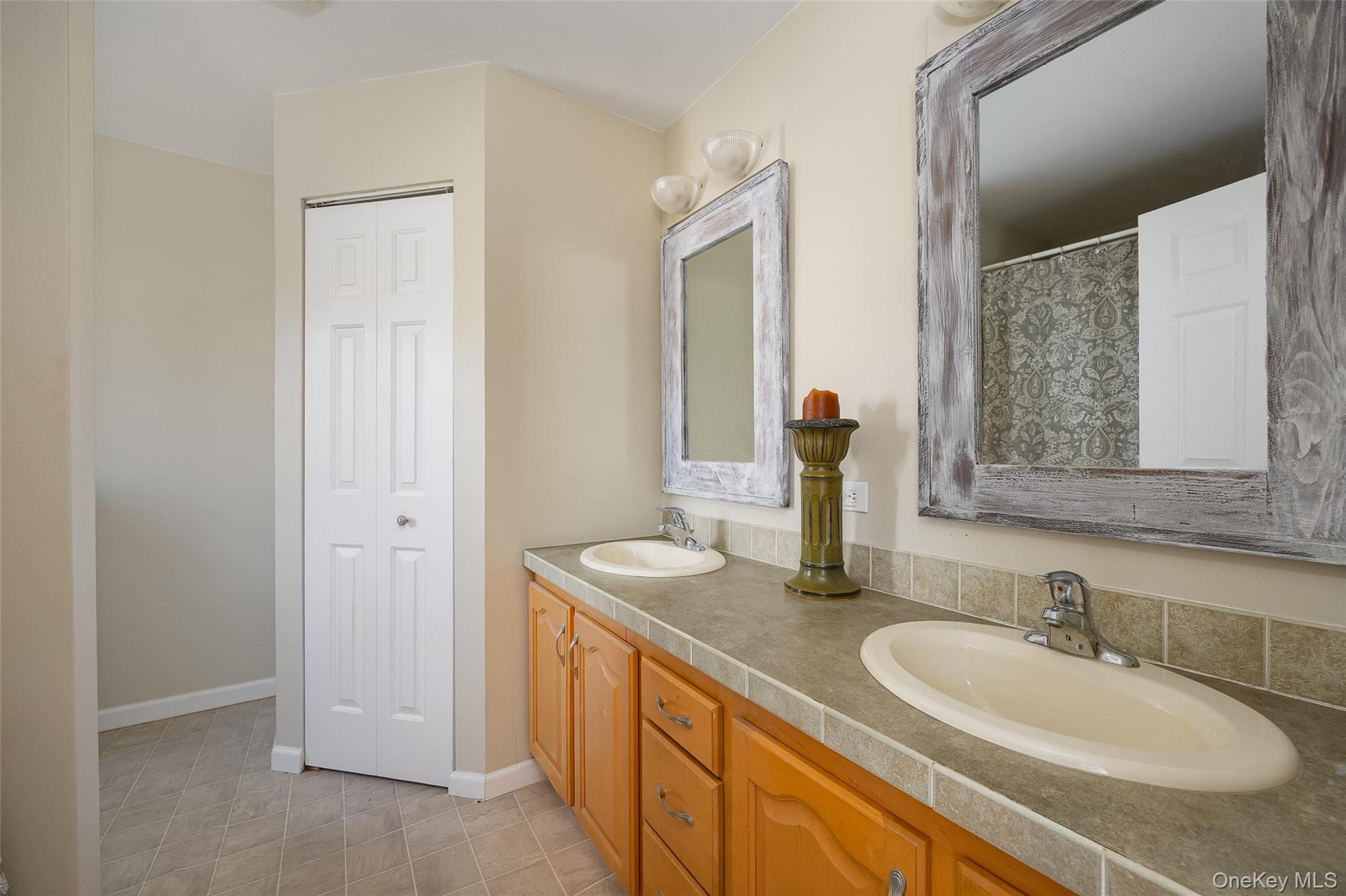 279 Milewood Road Millbrook, NY 12545 - Photo 18 of 33 a bathroom with a granite countertop sink and a mirror