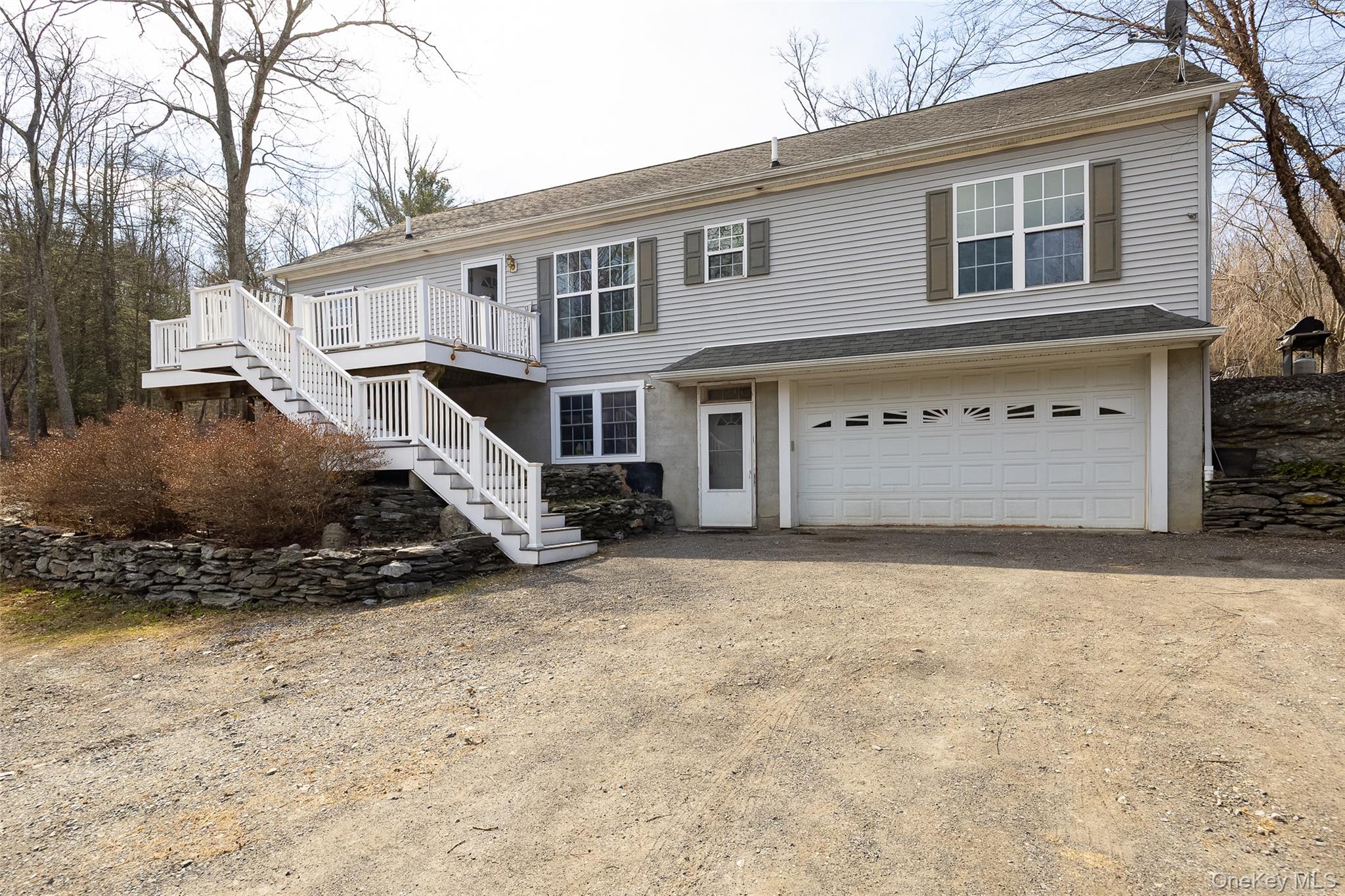 279 Milewood Road Millbrook, NY 12545 - Photo 3 of 33 a view of a house with a snow in the yard