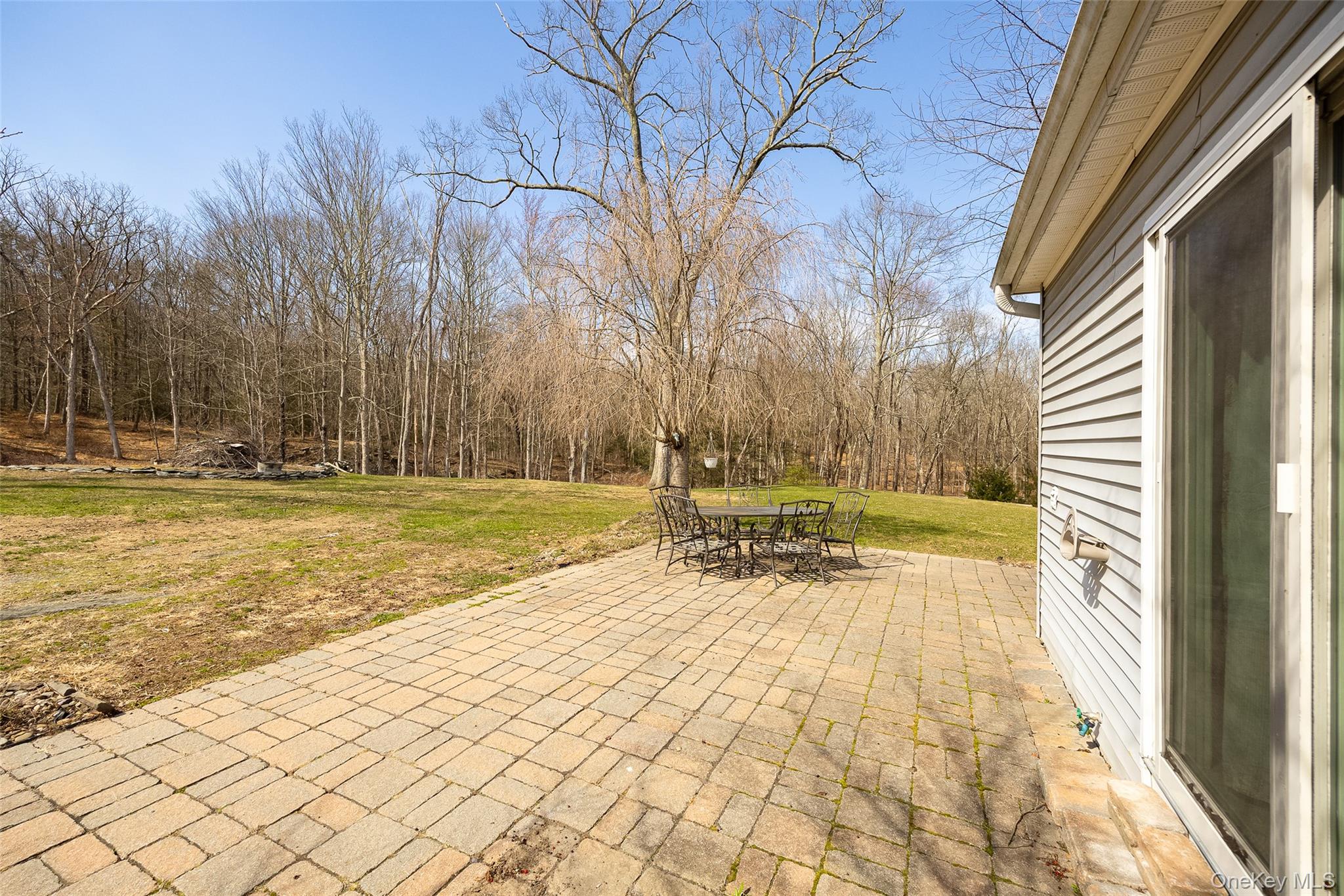 279 Milewood Road Millbrook, NY 12545 - Photo 31 of 33 a view of swimming pool with lawn chairs and wooden fence