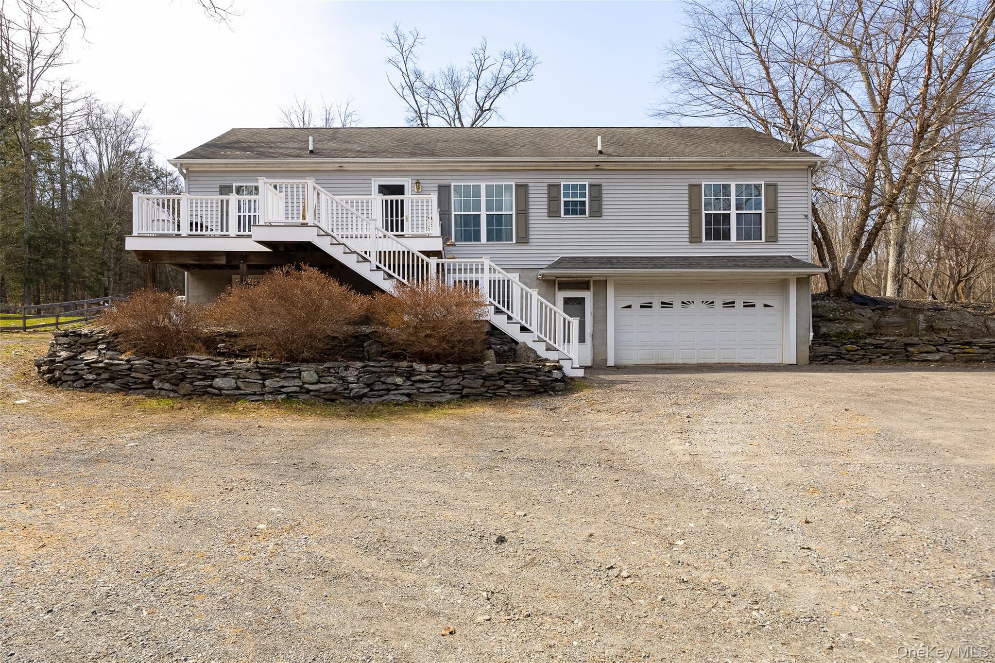 279 Milewood Road Millbrook, NY 12545 - Photo 4 of 33 a front view of a house with a yard