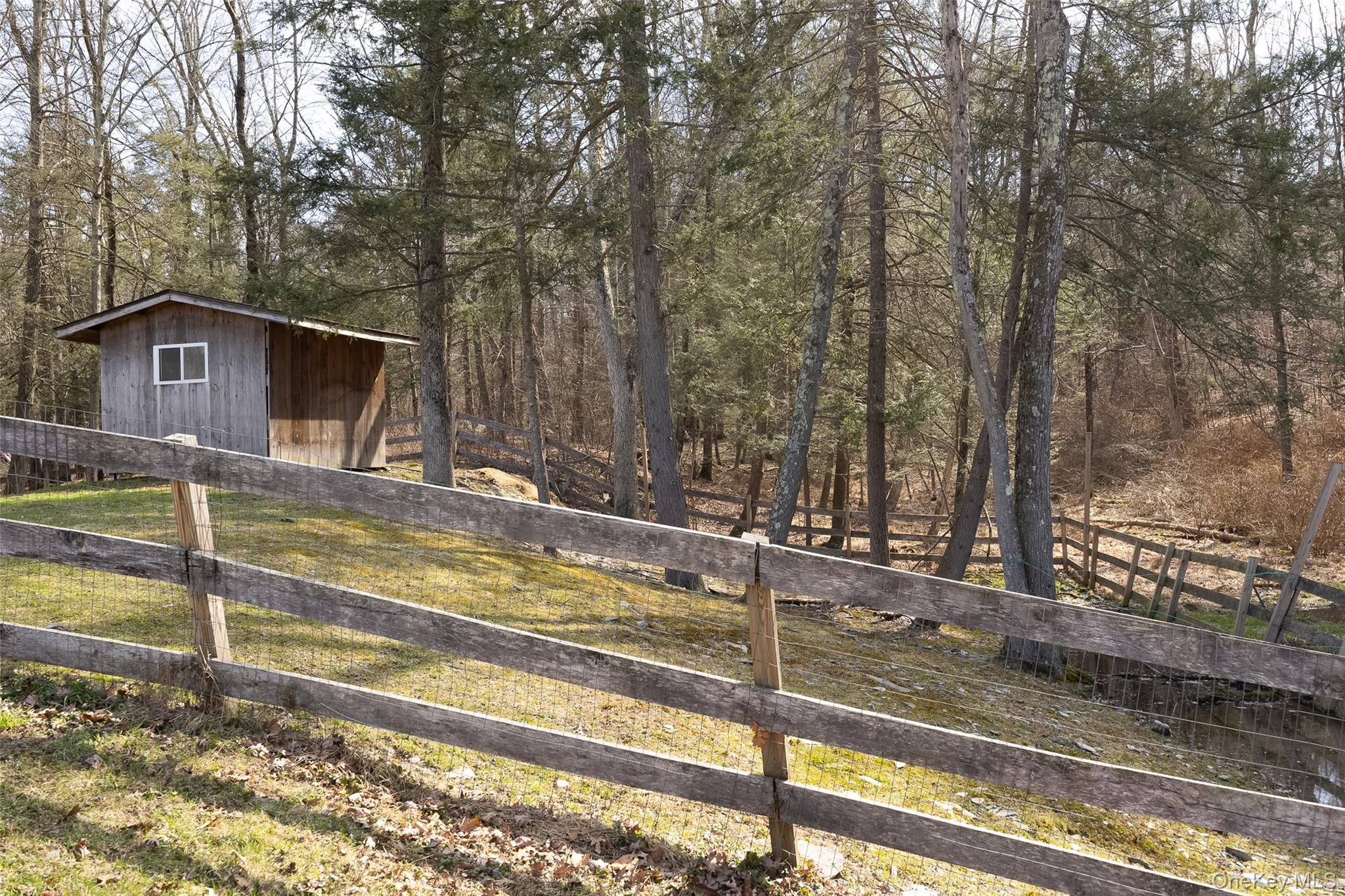 279 Milewood Road Millbrook, NY 12545 - Photo 5 of 33 a view of a house with a large trees