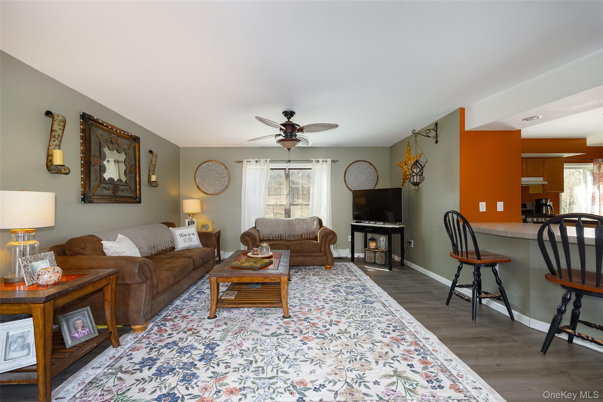 279 Milewood Road Millbrook, NY 12545 - Photo 6 of 33 a living room with furniture and a fireplace