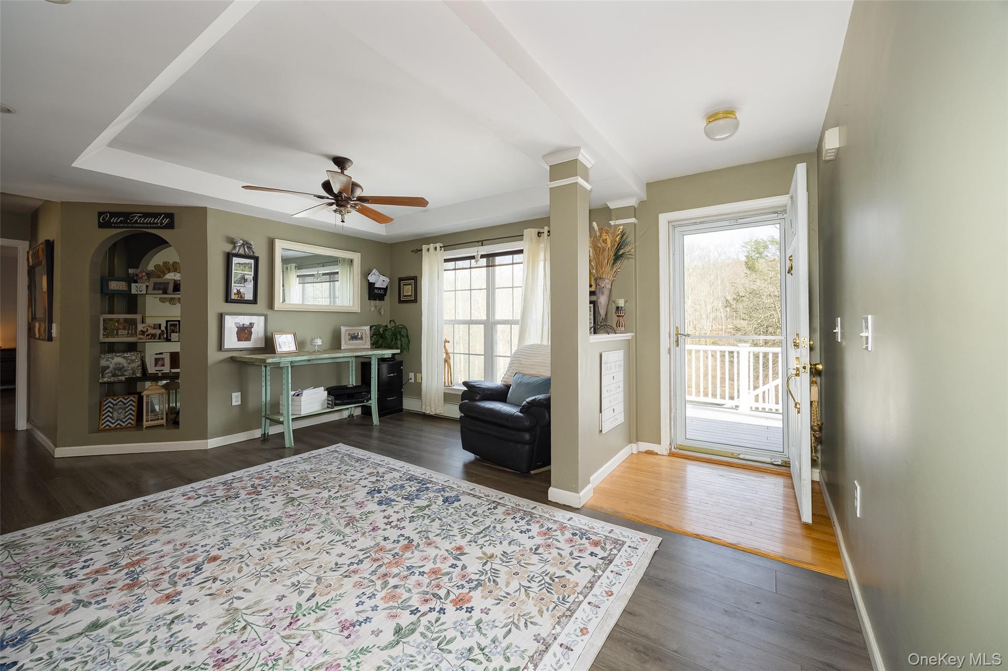 279 Milewood Road Millbrook, NY 12545 - Photo 8 of 33 a living room with furniture and a wooden floor