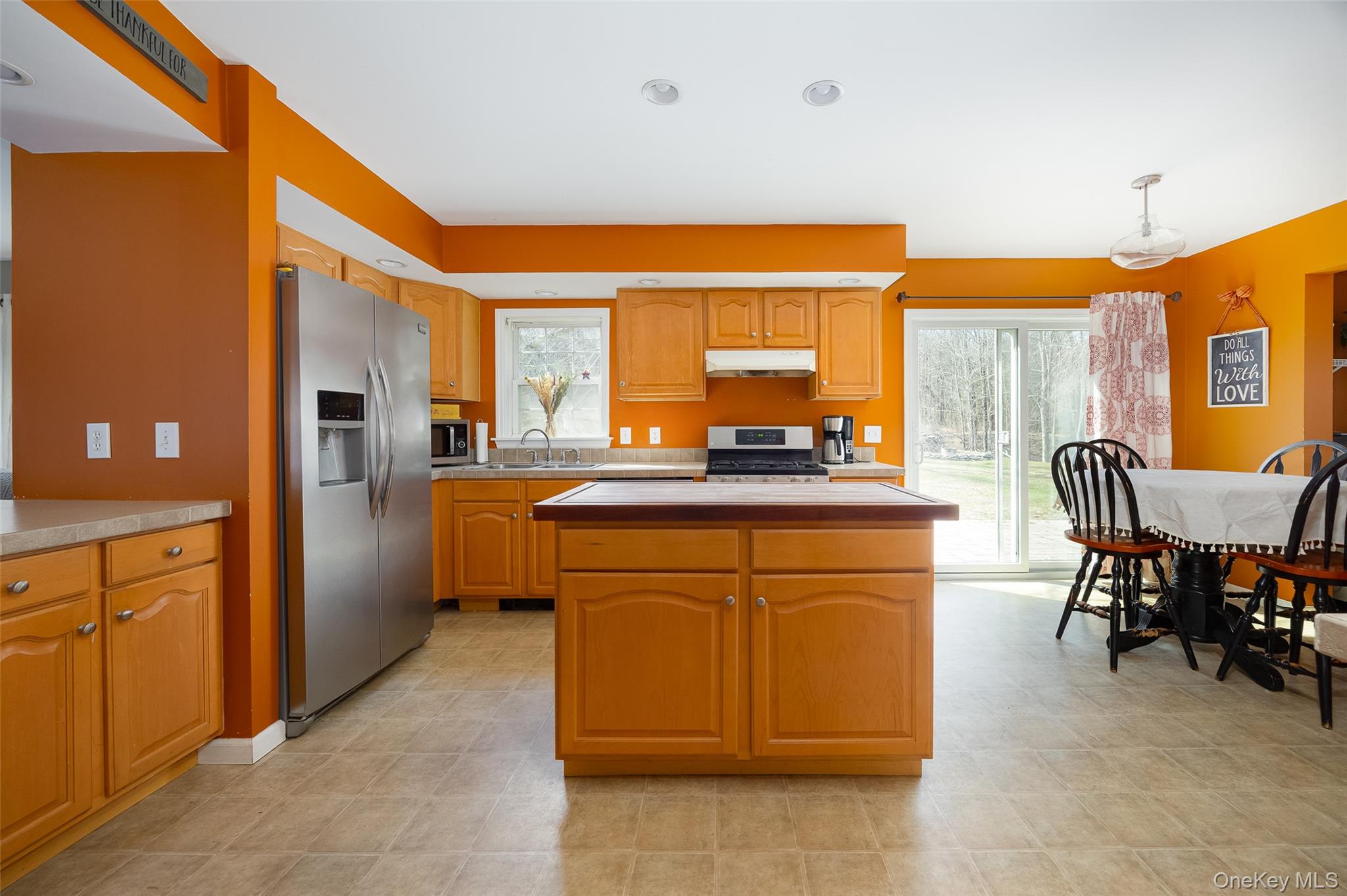 279 Milewood Road Millbrook, NY 12545 - Photo 9 of 33 a kitchen with stainless steel appliances granite countertop a refrigerator a stove and a sink