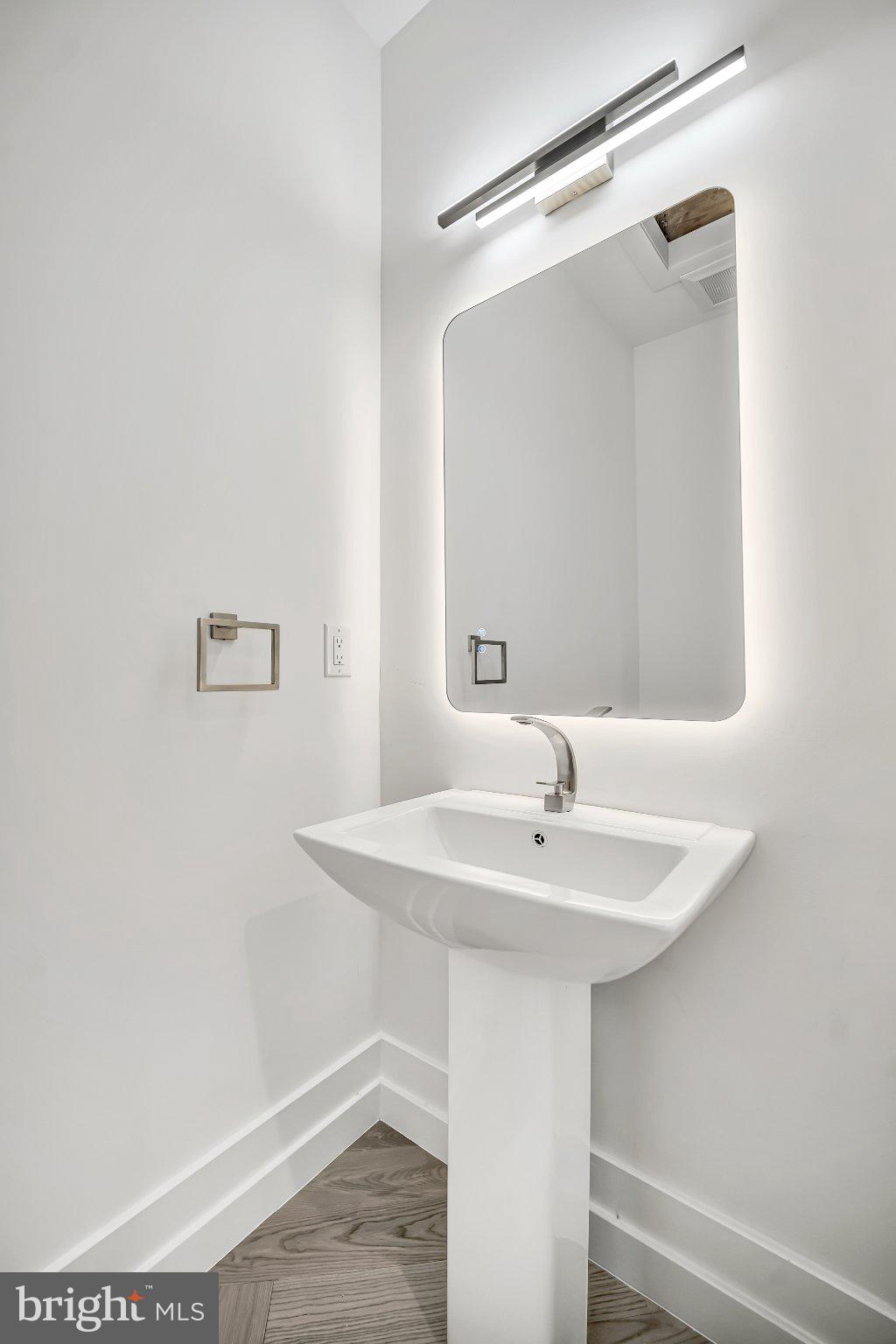 1502 Chinquapin Road Southampton, PA 18966 - Photo 36 of 42 Sleek modern powder room design.