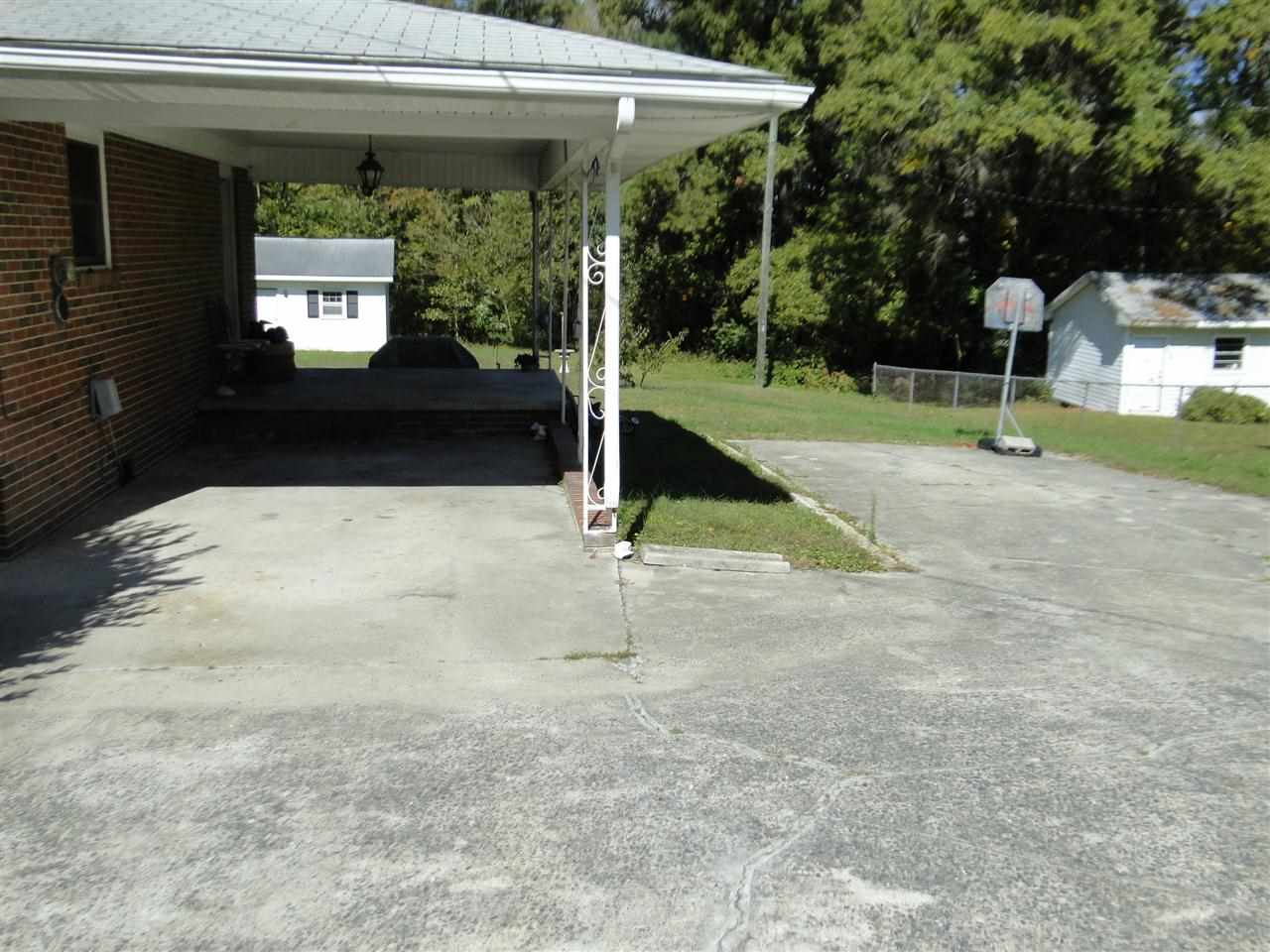 3911 Cheek Road Durham, NC 27704 - Photo 15 of 17 a view of outdoor space yard and porch