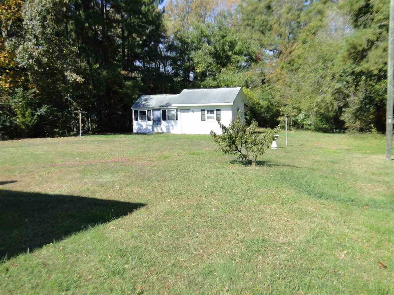 3911 Cheek Road Durham, NC 27704 - Photo 16 of 17 a view of a big yard with large trees
