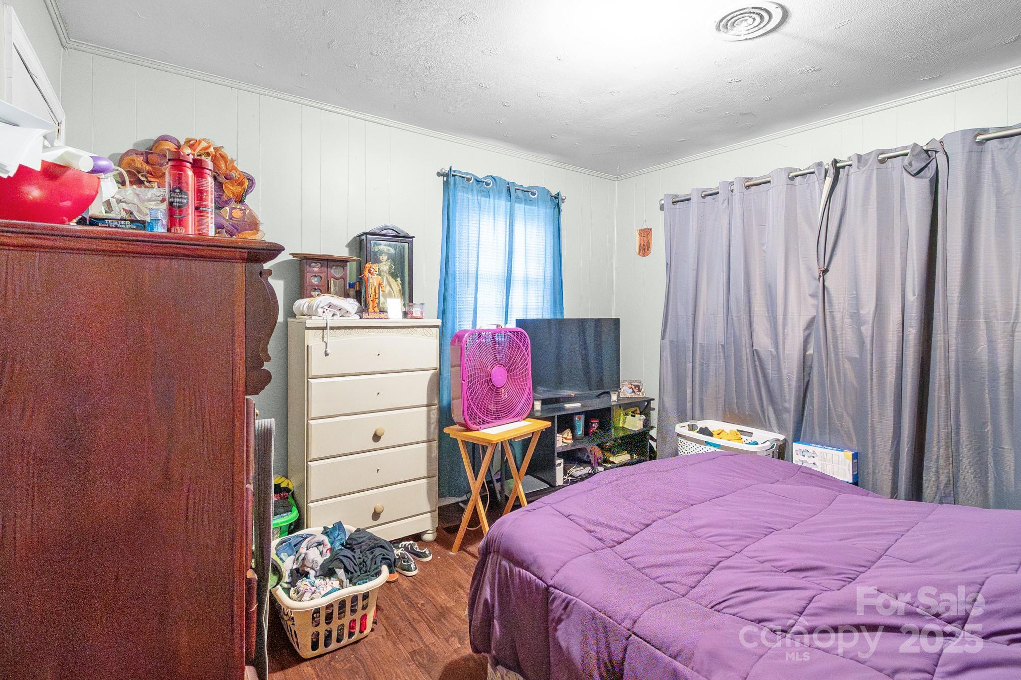 940 West End Road Chester, SC 29706 - Photo 14 of 16 a bedroom with a bed and a dresser in it