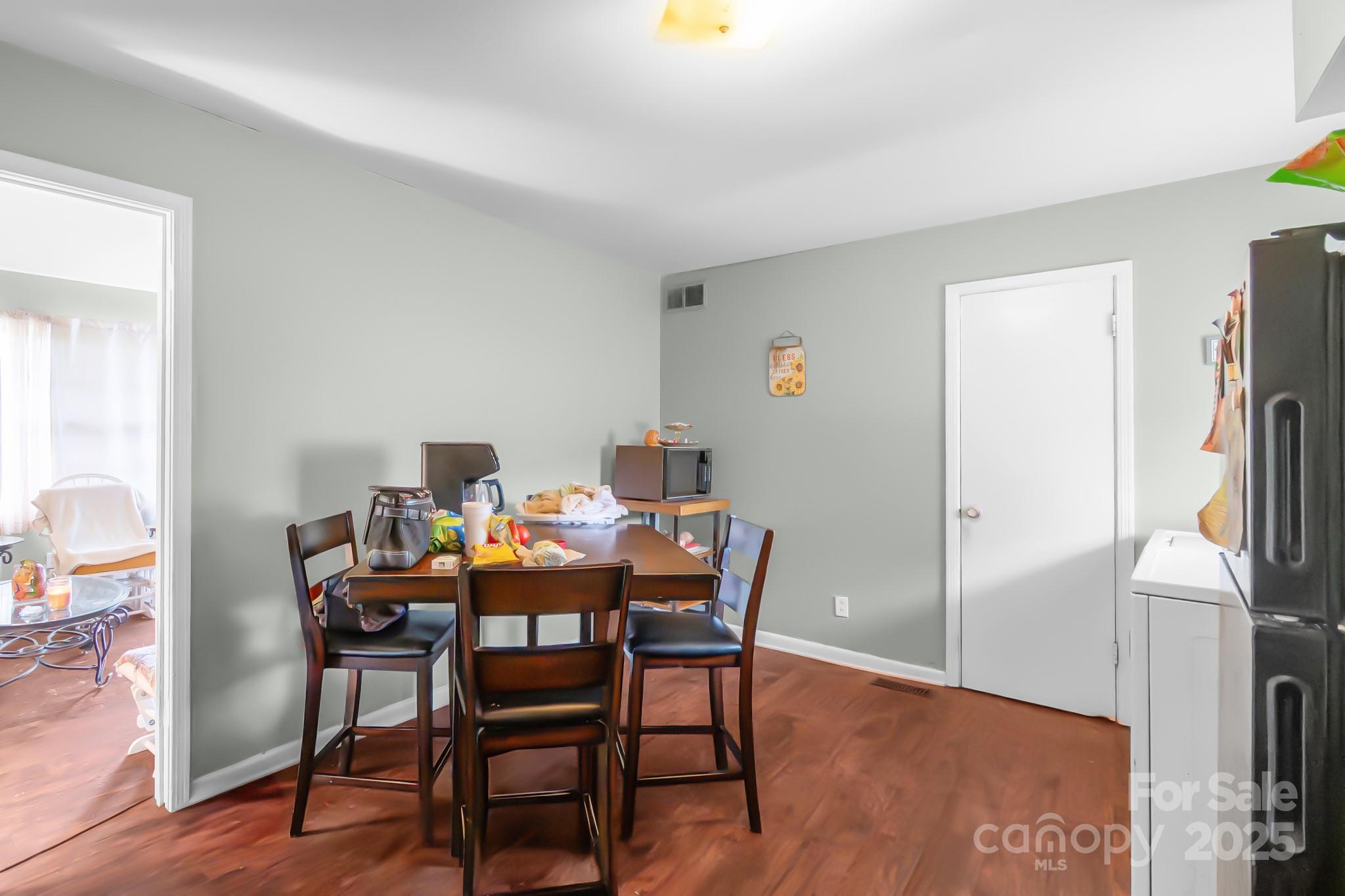 940 West End Road Chester, SC 29706 - Photo 10 of 16 a dining room with furniture and a floor to ceiling window