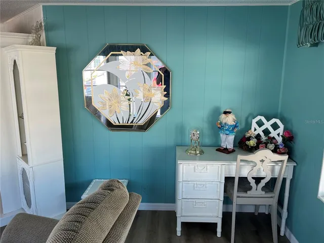 a view of a livingroom with furniture