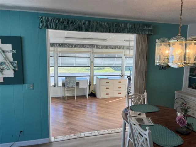 a room with furniture and a large window