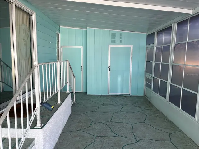 an entryway with staircase