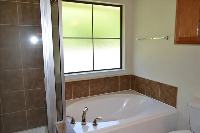 a bathroom with a bathtub