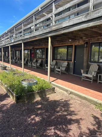 a view of a building with a patio