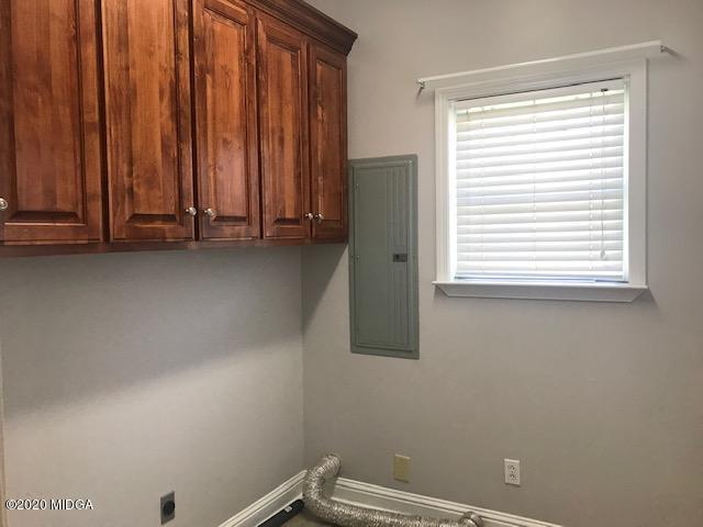 174 Rifle Range Road Gray, GA 31032 - Photo 16 of 39 a view of a room with a window and a shower