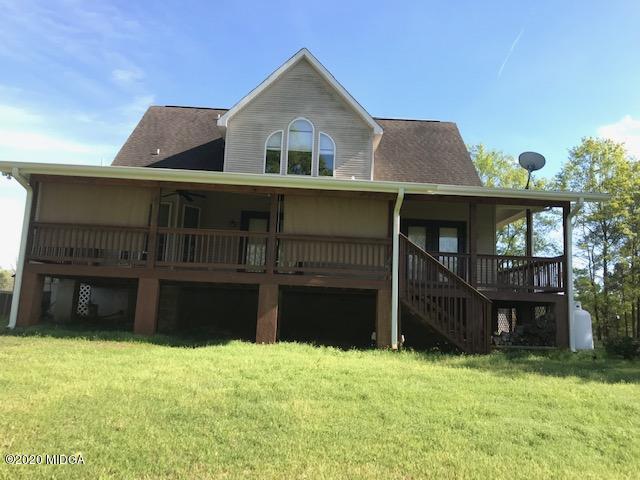 174 Rifle Range Road Gray, GA 31032 - Photo 3 of 39 a front view of a house with a yard and garage