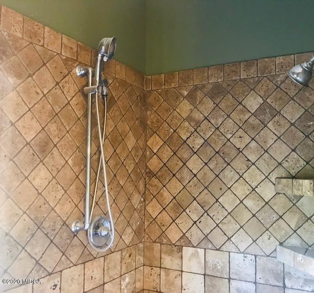 174 Rifle Range Road Gray, GA 31032 - Photo 21 of 39 a bathroom with a shower curtain
