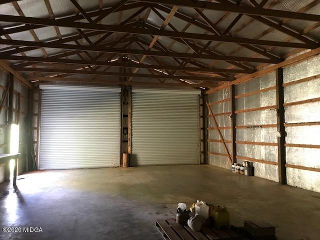 174 Rifle Range Road Gray, GA 31032 - Photo 33 of 39 a view of room with wooden floor
