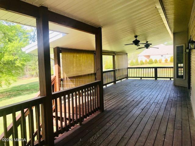 174 Rifle Range Road Gray, GA 31032 - Photo 35 of 39 a view of a porch with wooden floor