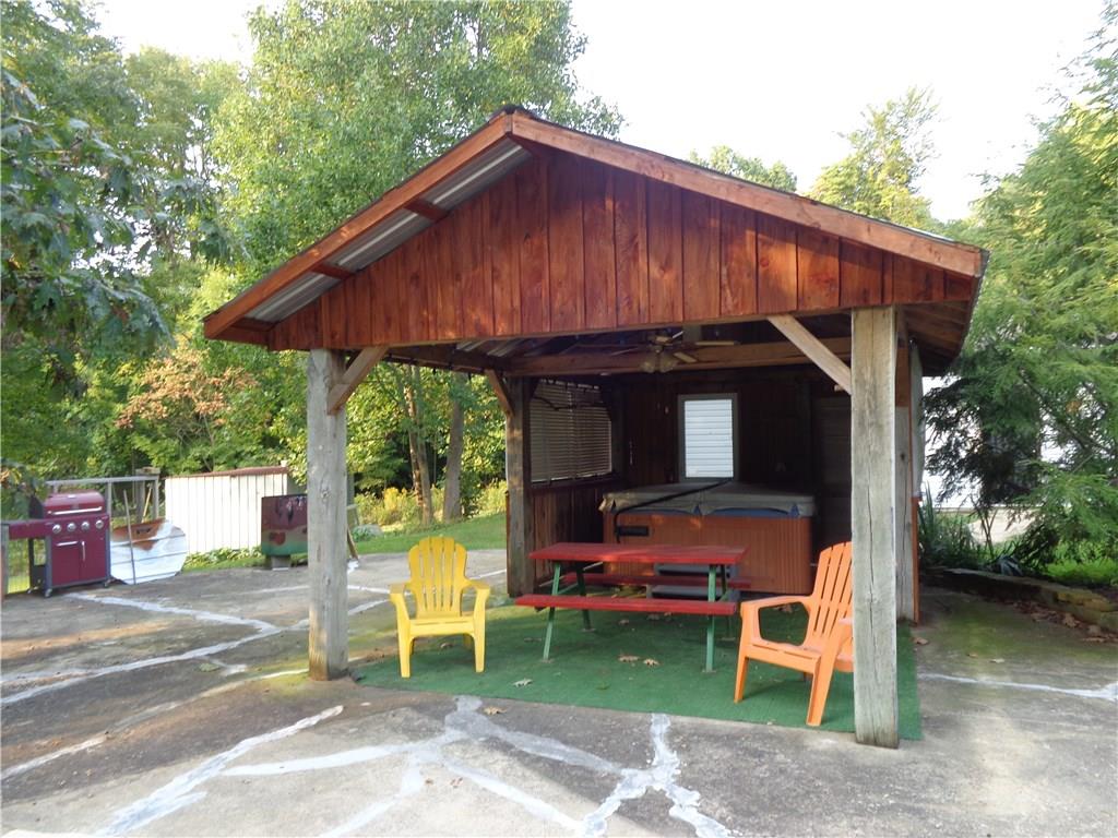 1047 Springfield Road Mercer, PA 16127 - Photo 17 of 25 covered party area and hot tub