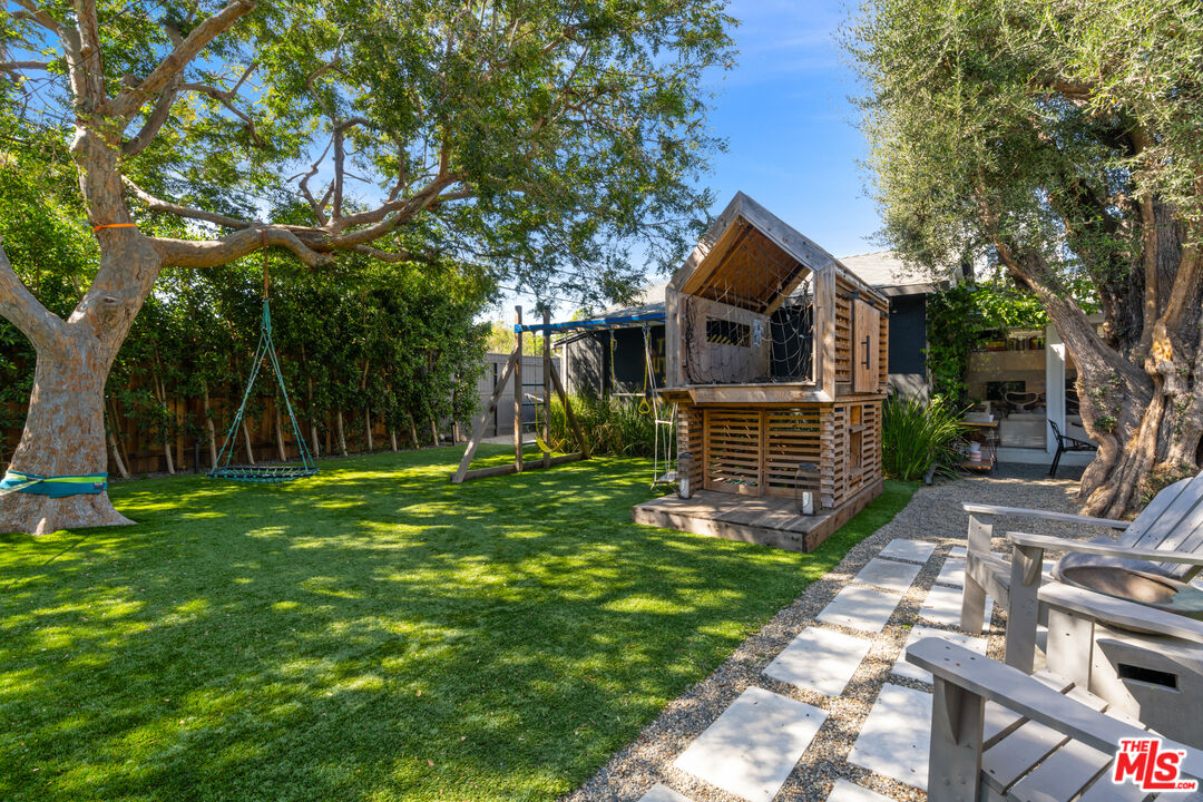 3301 McLaughlin Avenue Los Angeles, CA 90066 - Photo 21 of 46 a front view of a house with garden