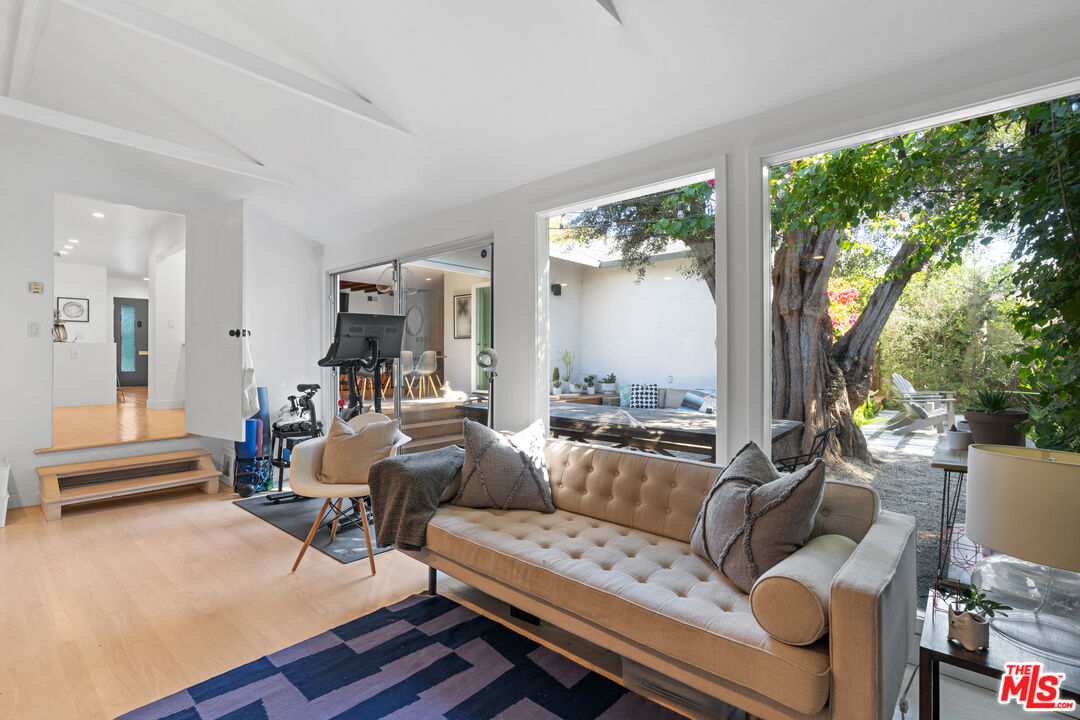 3301 McLaughlin Avenue Los Angeles, CA 90066 - Photo 26 of 46 a living room with furniture and a large window
