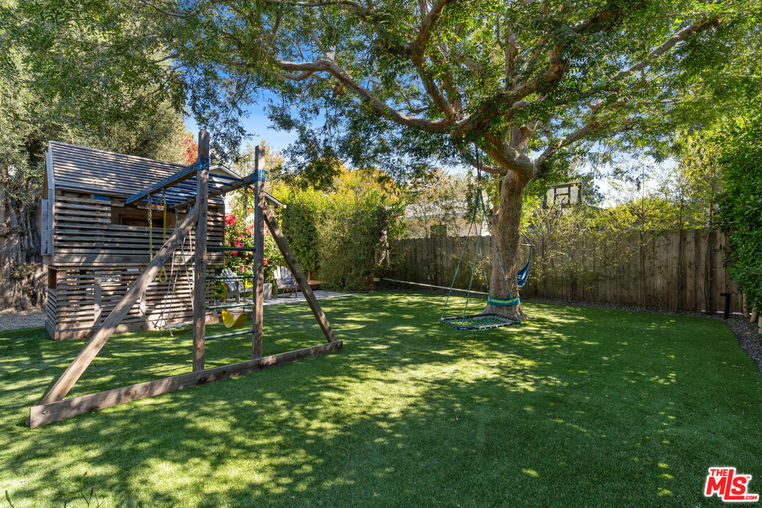 3301 McLaughlin Avenue Los Angeles, CA 90066 - Photo 4 of 46 a view of a yard with a tree