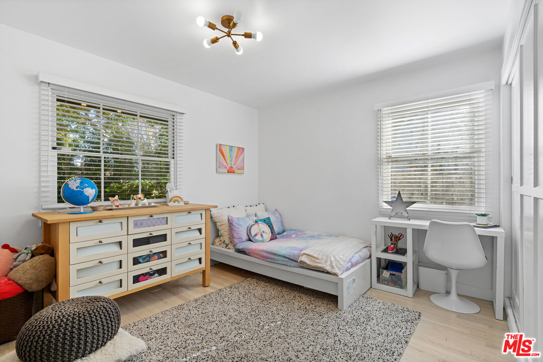 3301 McLaughlin Avenue Los Angeles, CA 90066 - Photo 36 of 46 a bedroom with a bed and a window